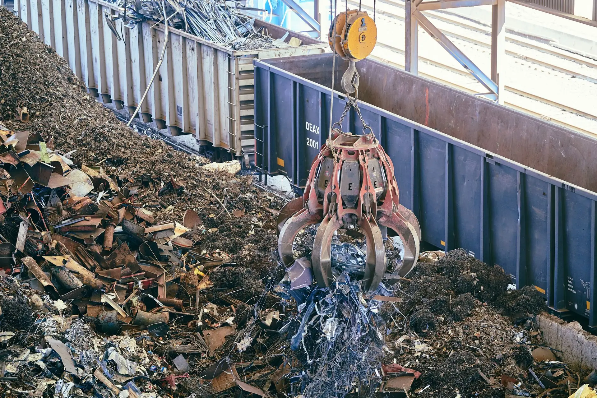 Ferrous scrap being loaded at a yard